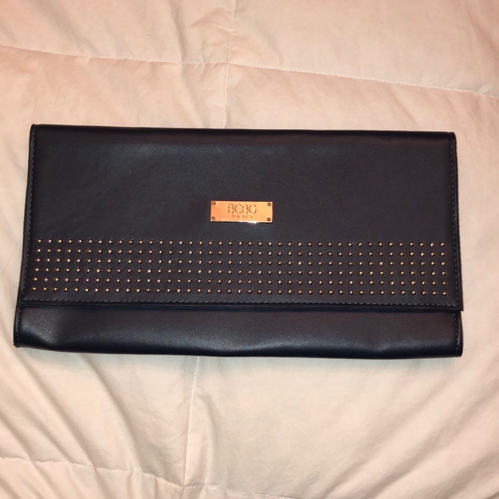 Sleek navy clutch with stud detail